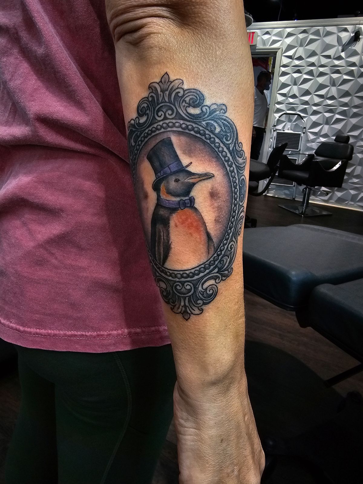 a person holding a tattoo